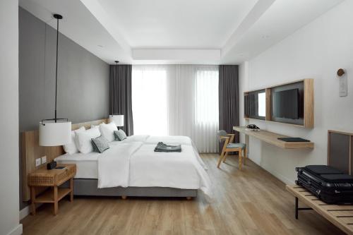 Katil atau katil-katil dalam bilik di Casa 17 Hotel Bangkok