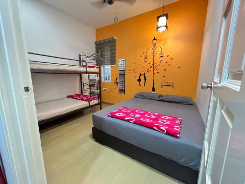Postel nebo postele na pokoji v ubytování Jiaxin Homestay - JP Pedana 家馨民宿