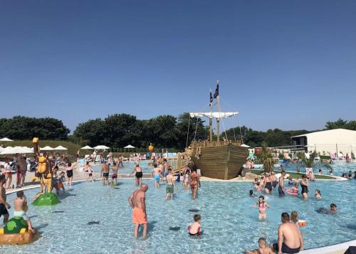 a large group of people in a swimming pool at Monkey Tree Holiday Park in Newquay