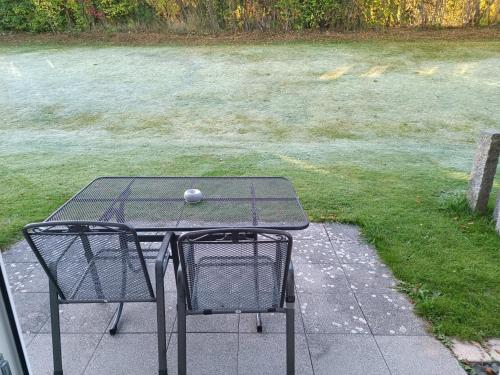 a table with a golf ball sitting on top of it at Hotel Ederstrand in Frankenberg