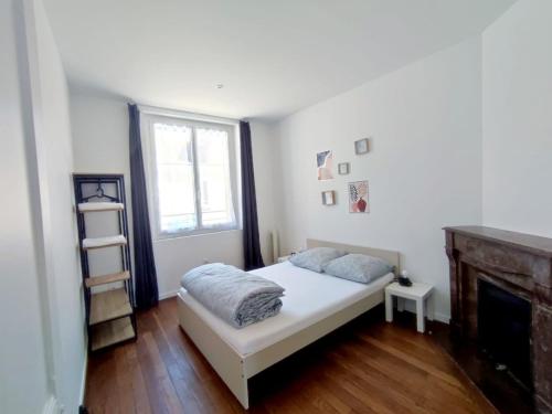 Postel nebo postele na pokoji v ubytování Appartement hyper centre de Montargis