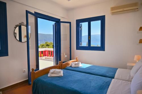 Ένα ή περισσότερα κρεβάτια σε δωμάτιο στο Villa Daisy Fiskardo