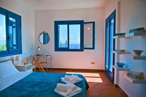 Ένα ή περισσότερα κρεβάτια σε δωμάτιο στο Villa Daisy Fiskardo