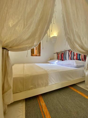 Cama o camas de una habitación en Hôtel Djerba Authentique - Au centre de Midoun