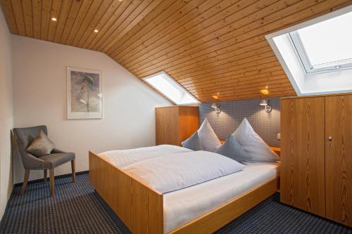 Tempat tidur dalam kamar di Ferienresort am Mattenweg