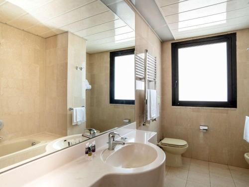 Un baño de Hotel Delfino Taranto