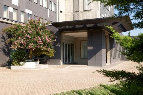 a entrance to a building with a building at Best Western Park Hotel Continental in San Donà di Piave