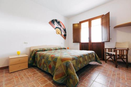 Säng eller sängar i ett rum på Appartamento 2 - La Poiana