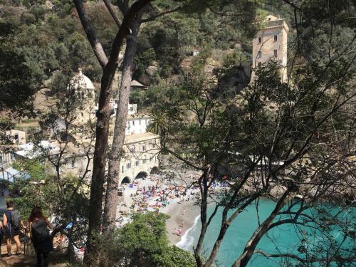 a group of people on a beach near a body of water at IN CANNETO...Genova nel cuore. in Genova