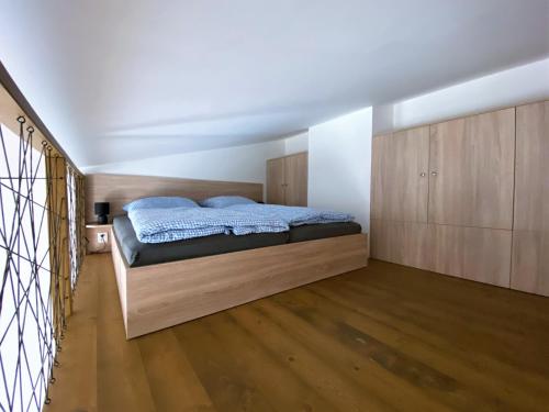 En eller flere senge i et værelse på Miky Apartmán Klínovec view