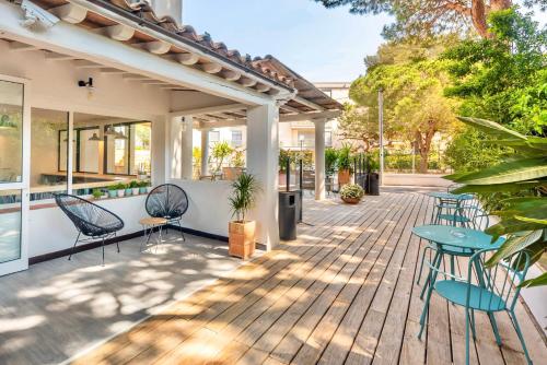 Posezení v ubytování L'Oasis Hotel