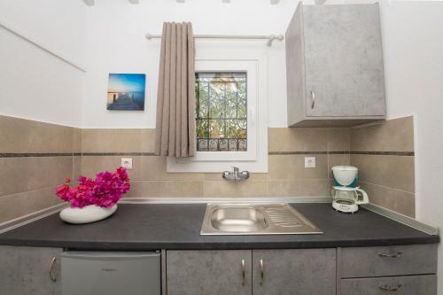 Кухня или мини-кухня в Aperto Apartments
