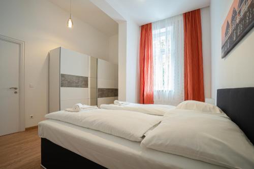 Postel nebo postele na pokoji v ubytování Apartment in the central area. 5 minute's walk to the Danube.