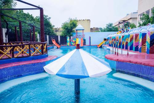 a water park with a slide in the water at Swad Ri Dhani, Ajmer in Ajmer