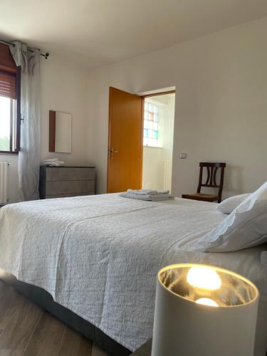 A bed or beds in a room at Villa Daniele