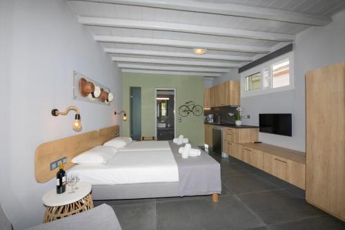 Кровать или кровати в номере Aperto Apartments