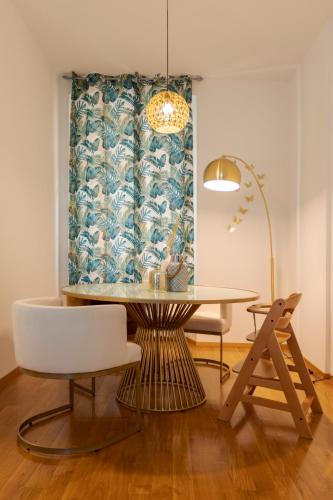 a dining room with a table and a chair at Cuore di Relais e Châteaux 5 STELLE in Bellinzona CITY OF CASTLES -By EasyLife Swiss in Bellinzona