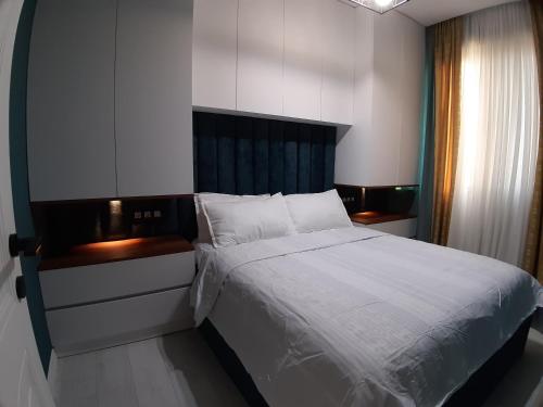 Ein Bett oder Betten in einem Zimmer der Unterkunft IRMA'S HOME