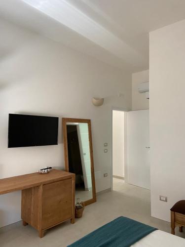 TV a/nebo společenská místnost v ubytování B&B Al tramonto Otranto
