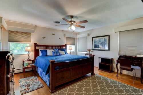 a bedroom with a bed and a ceiling fan at The Good Ole Days King Bed Pet Friendly in Daytona Beach