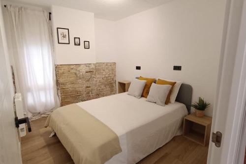 เตียงในห้องที่ BOUTIQUE 1 Apartment AVE Centro Lleida