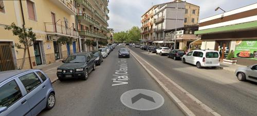 a street with cars parked on the side of the road at Kreart Suite & Rooms B&B in Crotone