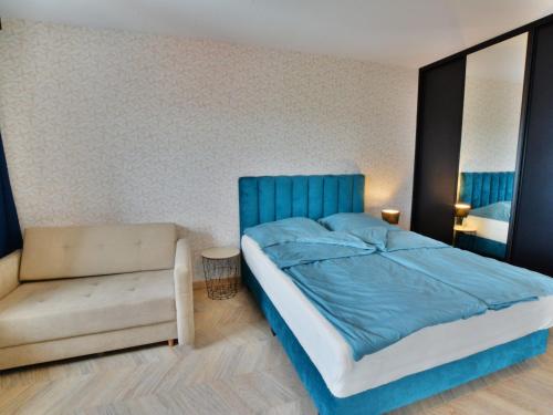 En eller flere senger på et rom på Comfortable apartment for 3 persons right by the sea, Ustronie Morskie