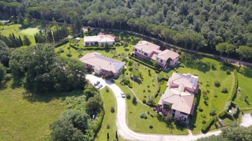 an aerial view of a large house with a yard at Montebelli Agriturismo & Country Hotel in Caldana