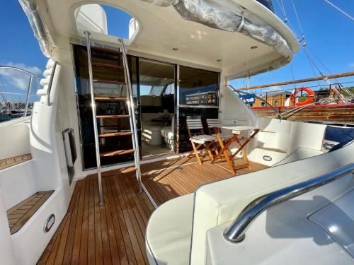 a view of the aft deck of a yacht at Tranquility Yachts -a 52ft Motor Yacht with waterfront views over Plymouth. in Plymouth