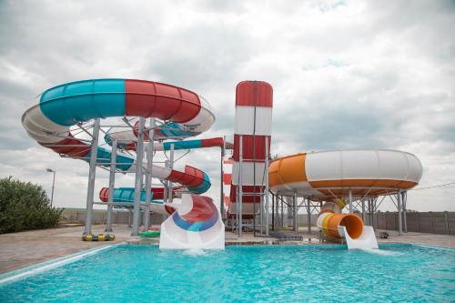 a water park with a water slide and a pool at S Club Resort Hotel Aqua Park and Spa in Belgrade