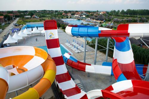 an amusement park with a pool and slides at S Club Resort Hotel Aqua Park and Spa in Belgrade