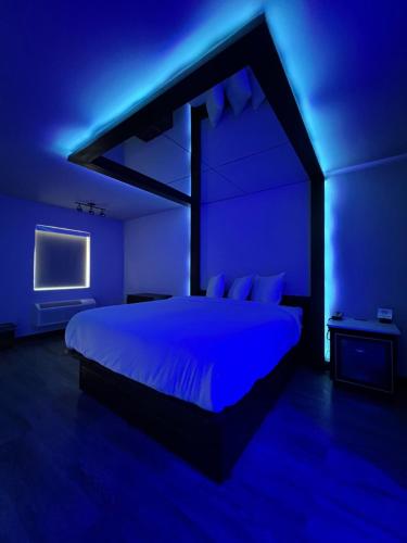Imperial Suites, Adults Onlyにあるベッド