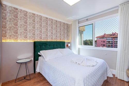 Postel nebo postele na pokoji v ubytování Com vista para Catedral - @stayhousetemporada