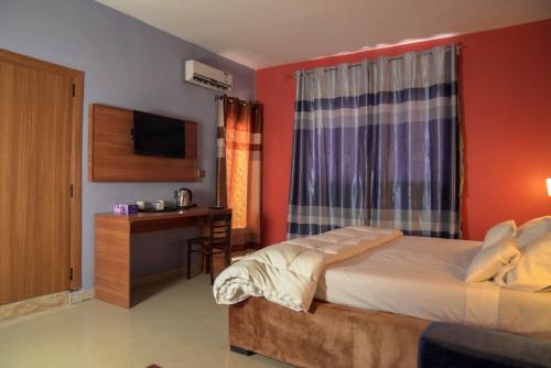 Postel nebo postele na pokoji v ubytování Dialali Hôtel Nouakchott