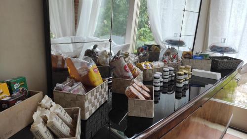 a counter with many boxes of food on it at Casa Tonello Zugliano in Zugliano