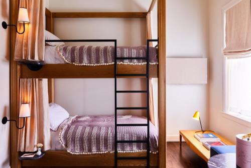 a bunk bed room with two bunk beds at The Siren Hotel, an Ash Hotel in Detroit
