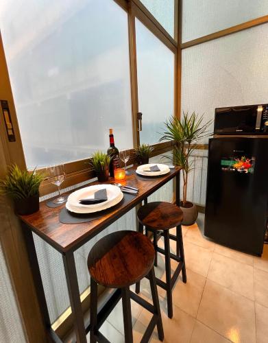 Η κουζίνα ή μικρή κουζίνα στο FELLINI SUITES Lungomare near the sea