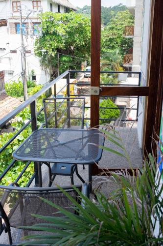 DownTown Rooms San Pancho Mexicoにあるバルコニーまたはテラス