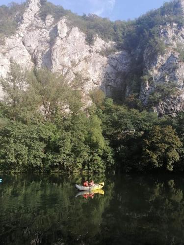 a group of people in a kayak in the water at Ovcar banja in Čačak