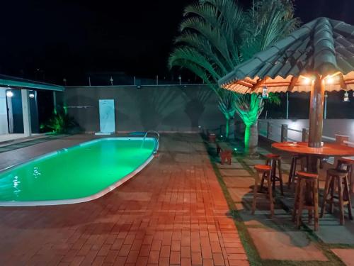 Kolam renang di atau dekat dengan Chacara com piscina e muito lazer em Jarinu SP