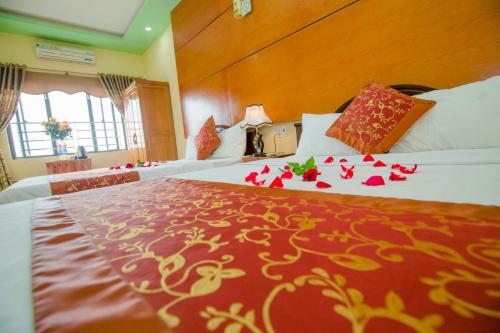 Cat Ba Bay Vision Hotelにあるベッド