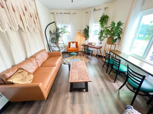 a living room with a couch and a table at ITH Mission Beach Backpacker Hostel in San Diego