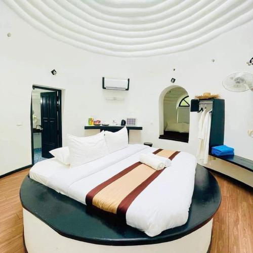 Llit o llits en una habitació de Moonlight Resort