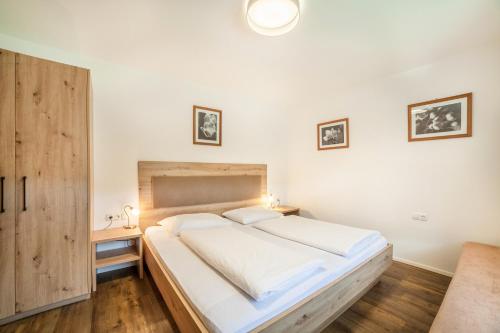 Postel nebo postele na pokoji v ubytování Parigger Apt Lavendel