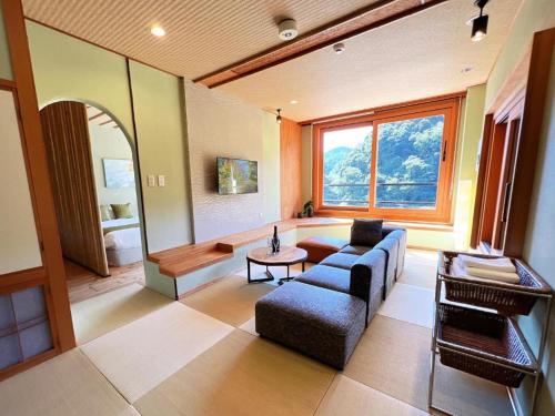 Posezení v ubytování OWL RESORT ARIFUKU ONSEN