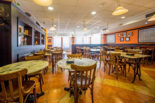 Εστιατόριο ή άλλο μέρος για φαγητό στο Hotel Iris Guadalajara