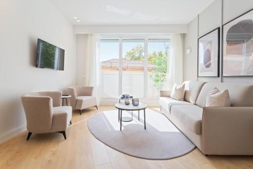 Et opholdsområde på Uma Suites O'Donnell