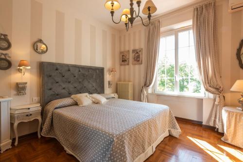 Ένα ή περισσότερα κρεβάτια σε δωμάτιο στο Villa la Quercia by Mmega