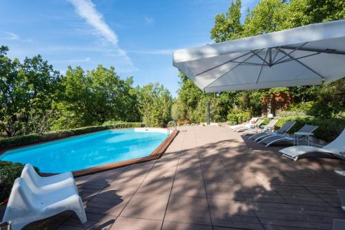 Πισίνα στο ή κοντά στο Villa la Quercia by Mmega