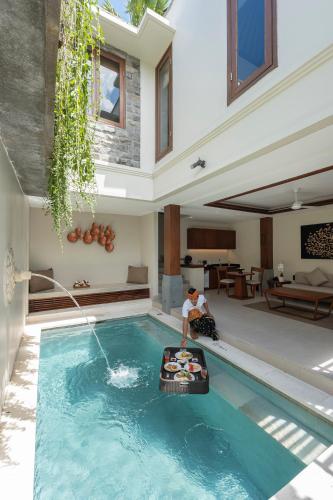 Πισίνα στο ή κοντά στο tanadewa Villas Nusa Dua Bali by Cross Collection